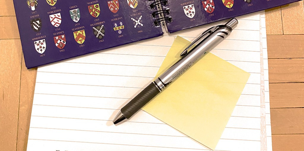 Notebooks and a pencil